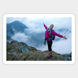 Woman backpacker hiking on a trail Sticker